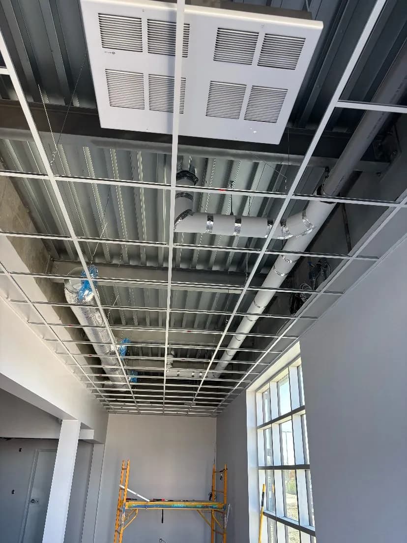 Seton Carwash: exterior steel stud framing, drywall installation, taping to level 4, acoustical ceilings, drywall boxes around piping by Quality Gypsum Services